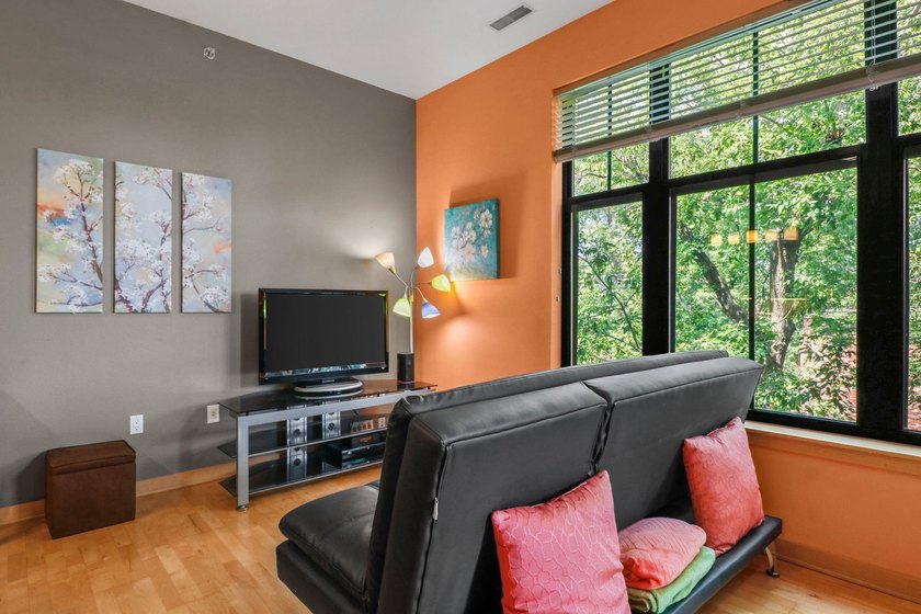 Perched on the top floor, this spacious 1BR condo offers an - photo 16