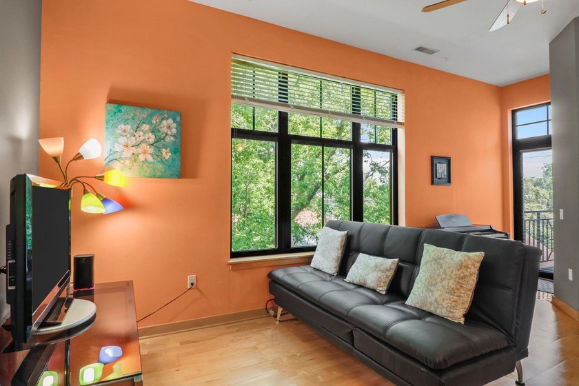 Perched on the top floor, this spacious 1BR condo offers an - photo 17