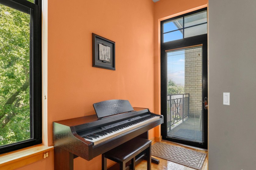 Perched on the top floor, this spacious 1BR condo offers an - photo 18