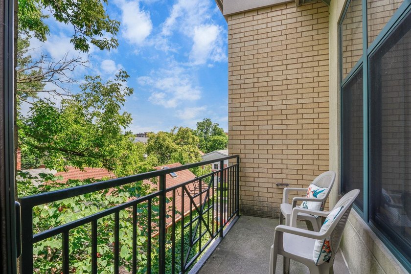 Perched on the top floor, this spacious 1BR condo offers an - photo 19