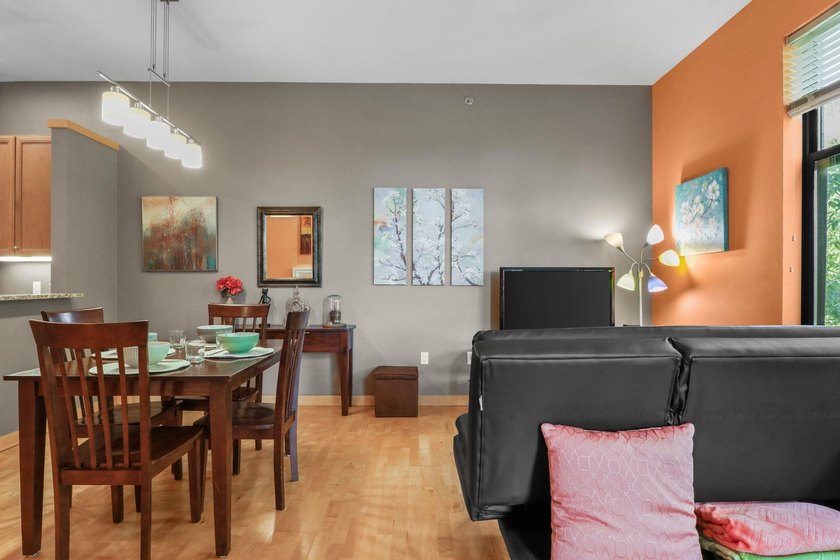 Perched on the top floor, this spacious 1BR condo offers an - photo 21
