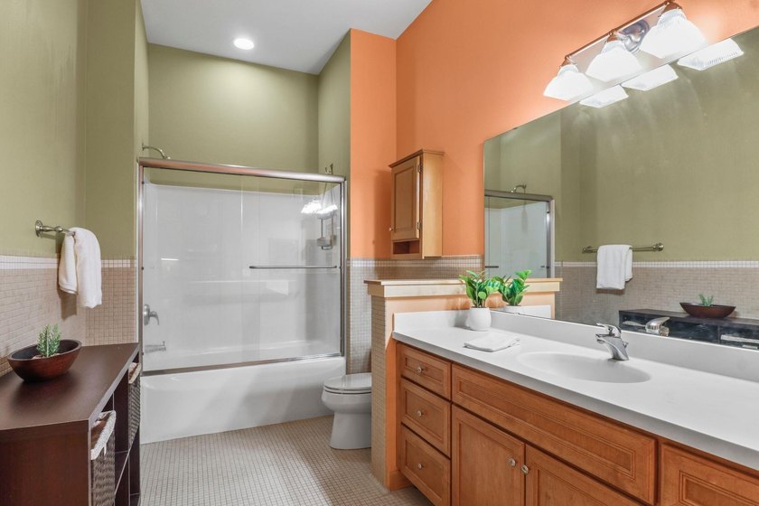 Perched on the top floor, this spacious 1BR condo offers an - photo 32