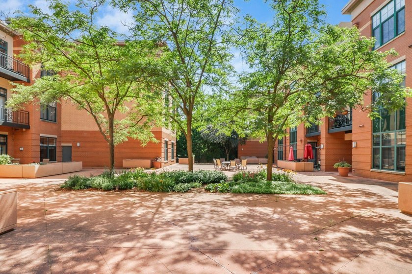 Perched on the top floor, this spacious 1BR condo offers an - photo 37