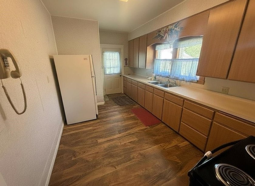 This charming 4-bedroom home sits on a desirable corner lot and - photo 11