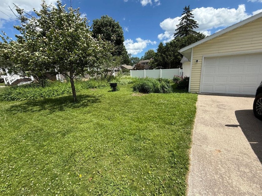 This charming 4-bedroom home sits on a desirable corner lot and - photo 29
