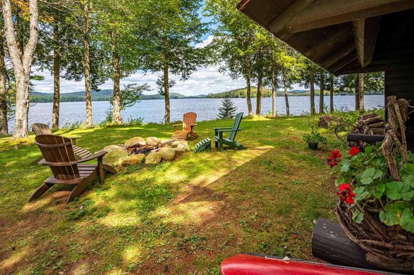 'Tojenka' is a rare Big Moose Lake estate offering an - photo 48