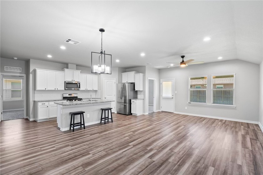 STOP scrolling and SAVE BIG with a 5.5% VA ASSUMABLE LOAN! This - photo 3