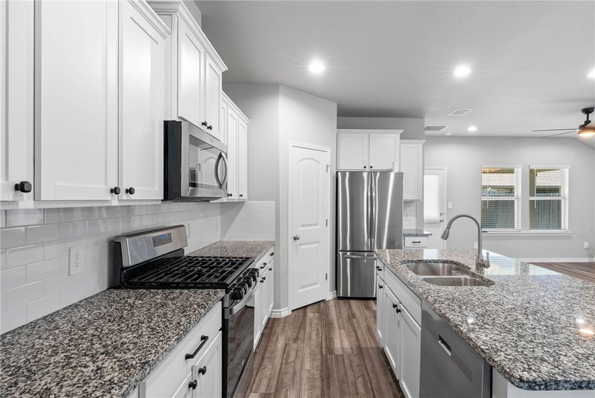 STOP scrolling and SAVE BIG with a 5.5% VA ASSUMABLE LOAN! This - photo 5