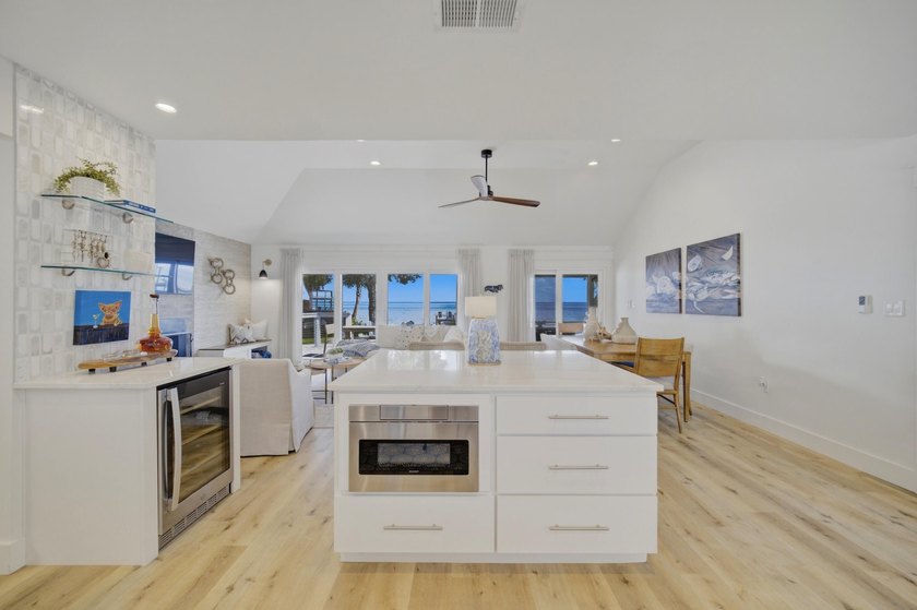 Beautifully remodeled coastal home featuring a private dock - photo 18