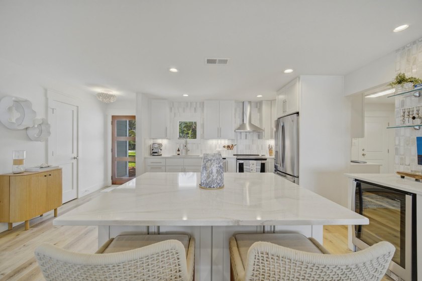 Beautifully remodeled coastal home featuring a private dock - photo 21