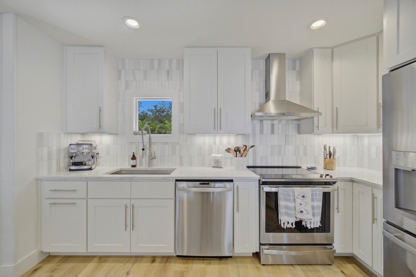 Beautifully remodeled coastal home featuring a private dock - photo 23