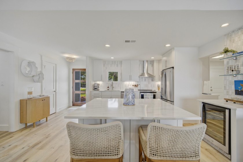 Beautifully remodeled coastal home featuring a private dock - photo 26