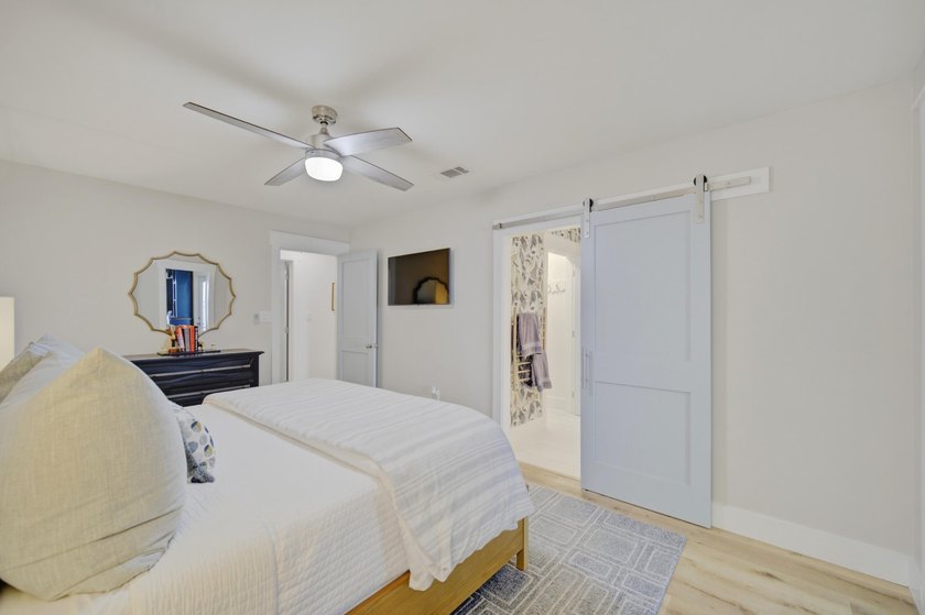 Beautifully remodeled coastal home featuring a private dock - photo 29