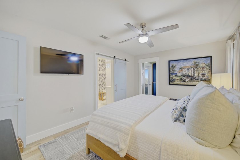 Beautifully remodeled coastal home featuring a private dock - photo 32