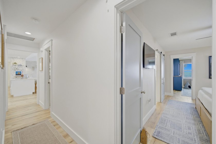 Beautifully remodeled coastal home featuring a private dock - photo 49