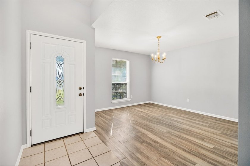WELL CARED FOR all brick home on large tree shaded lot with new - photo 3