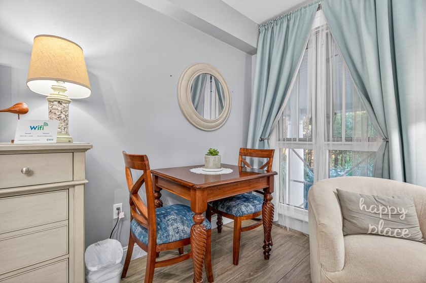 This fully furnished second floor condo located in the Grand - photo 11