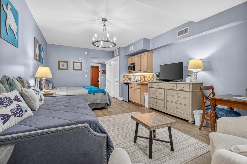 This fully furnished second floor condo located in the Grand - photo 14