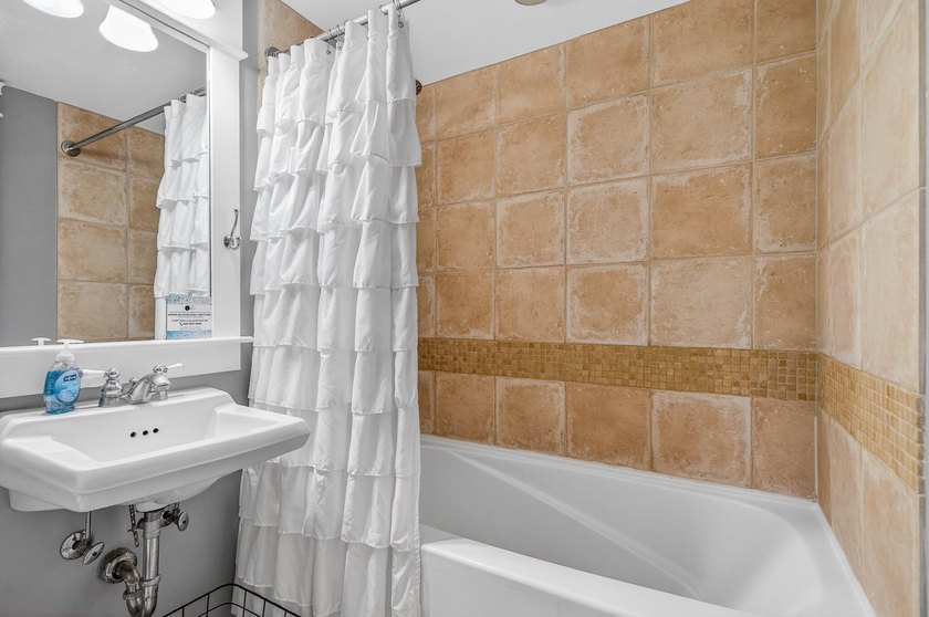 This fully furnished second floor condo located in the Grand - photo 25