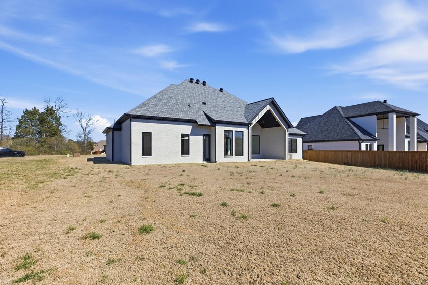 Located within a gated subdivision featuring a neighborhood pond - photo 44