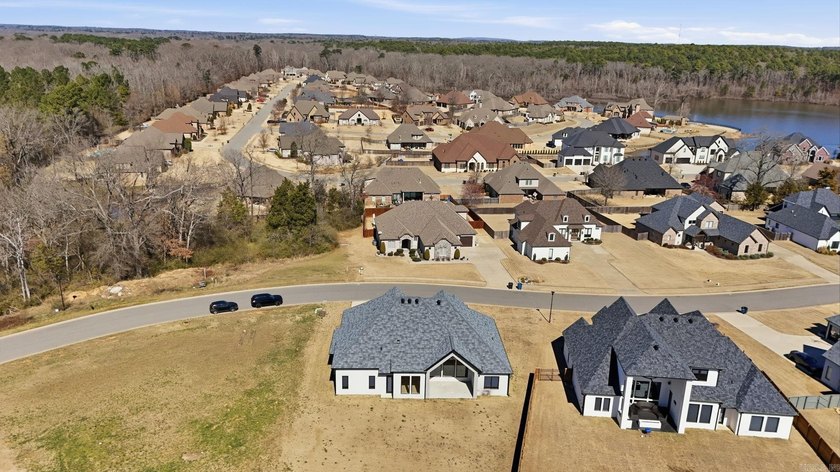 Located within a gated subdivision featuring a neighborhood pond - photo 47