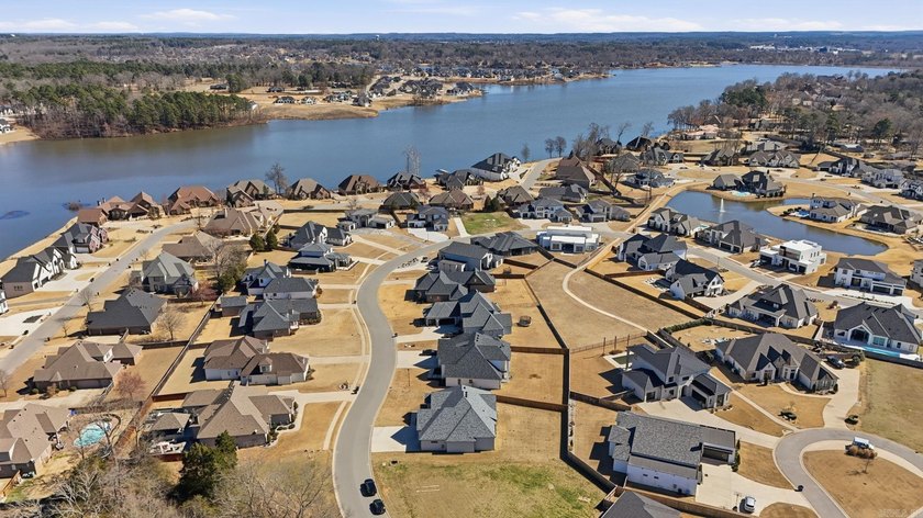 Located within a gated subdivision featuring a neighborhood pond - photo 50