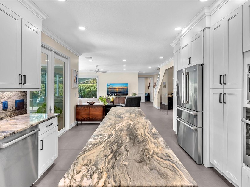 Beautifully updated 5-bedroom, 3-bath, 3-car garage home with - photo 12