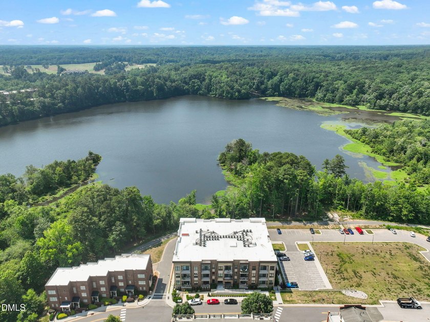 Hidden gem on Centennial Campus! This first-floor condo offers - photo 2