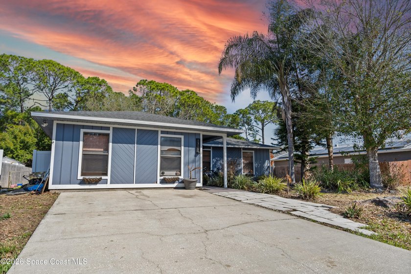Opportunity awaits with this 4 bedroom, 2 bathroom home in Palm - photo 2