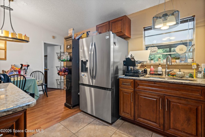 Opportunity awaits with this 4 bedroom, 2 bathroom home in Palm - photo 8