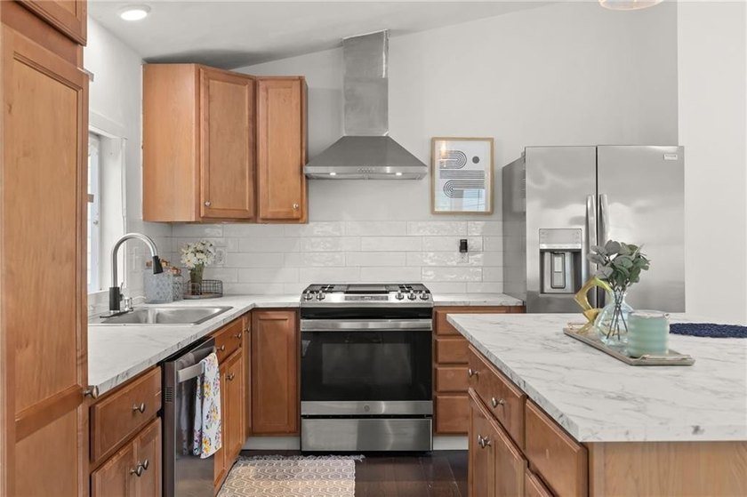 Tucked away in a peaceful setting, this three-bedroom - photo 11