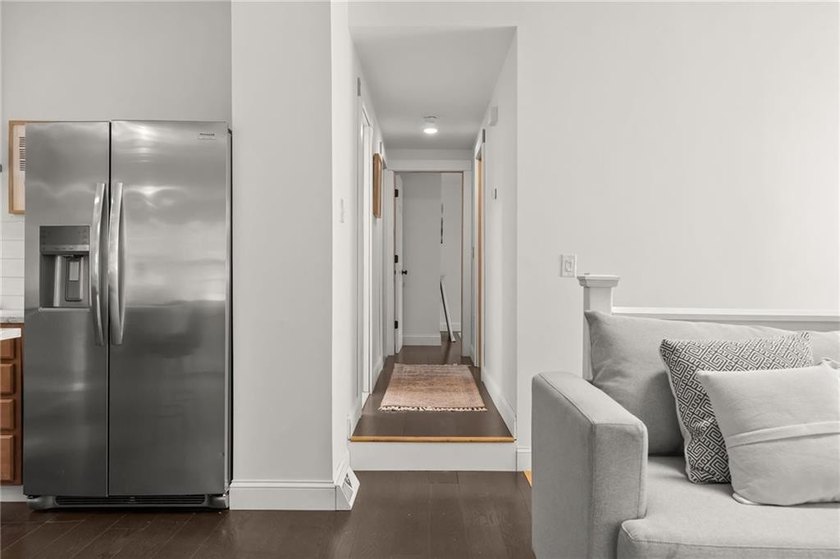 Tucked away in a peaceful setting, this three-bedroom - photo 17