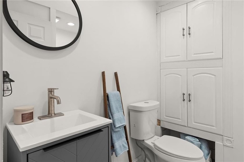 Tucked away in a peaceful setting, this three-bedroom - photo 18
