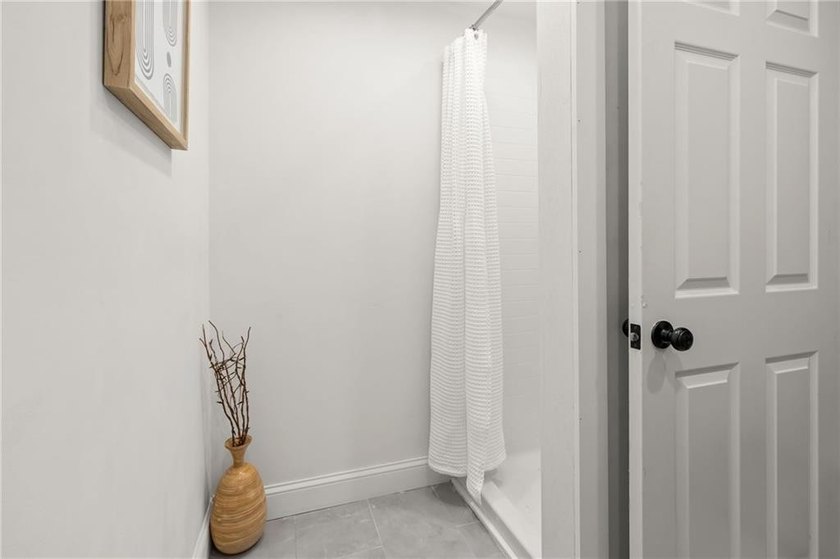 Tucked away in a peaceful setting, this three-bedroom - photo 19