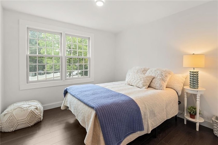 Tucked away in a peaceful setting, this three-bedroom - photo 20