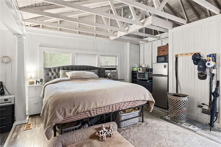 Tucked away in a peaceful setting, this three-bedroom - photo 24