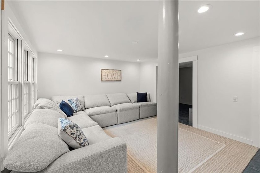 Tucked away in a peaceful setting, this three-bedroom - photo 31