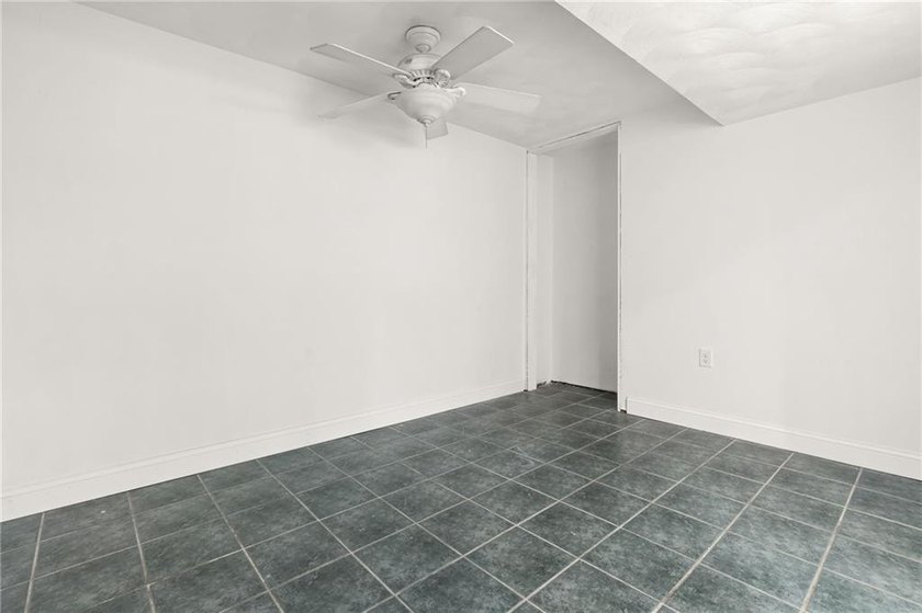 Tucked away in a peaceful setting, this three-bedroom - photo 34