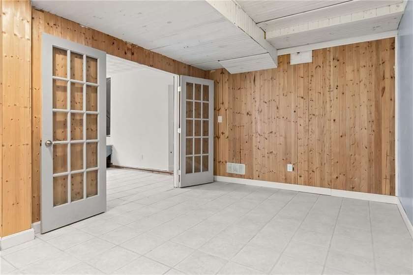 Tucked away in a peaceful setting, this three-bedroom - photo 39
