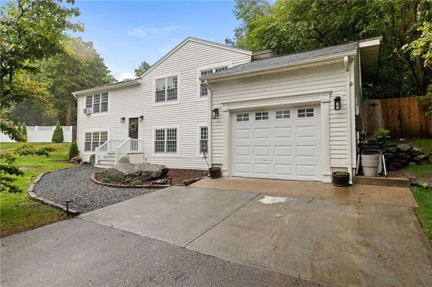 Tucked away in a peaceful setting, this three-bedroom - photo 42