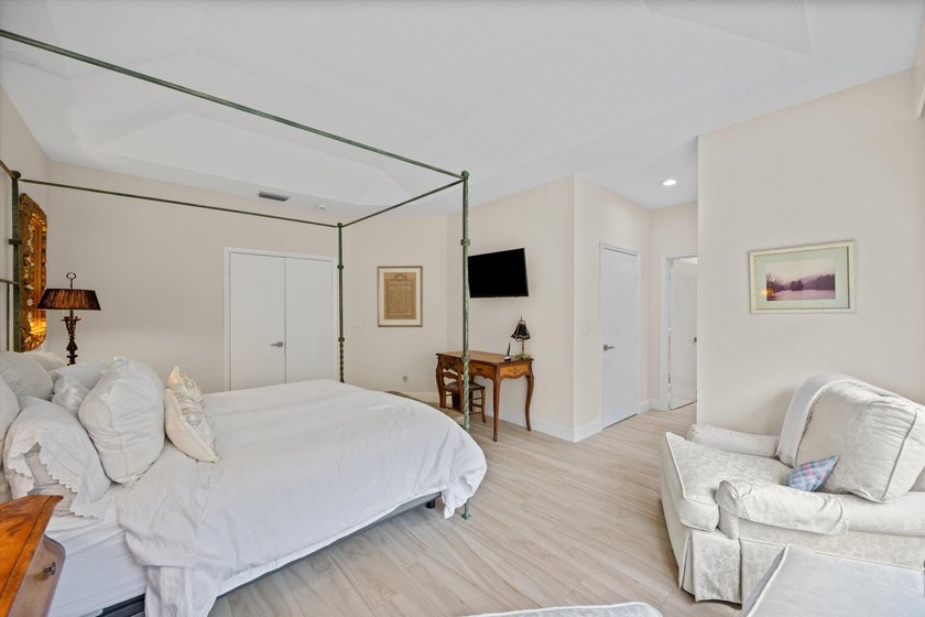 Fully renovated and move-in ready, this stunning villa offers - photo 16