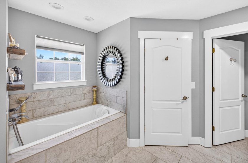 Nestled on a .54 acre corner cul-de-sac lot in the gated - photo 30