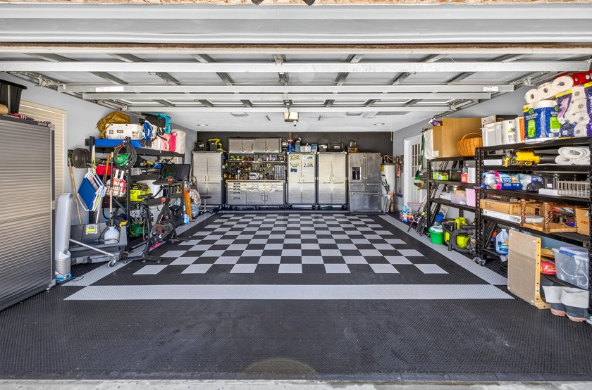 Nestled on a .54 acre corner cul-de-sac lot in the gated - photo 50