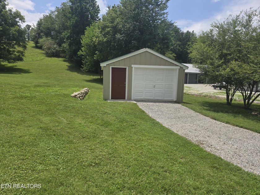 This adorable, fully updated 3 bedroom, 2 full bath home sits on - photo 11