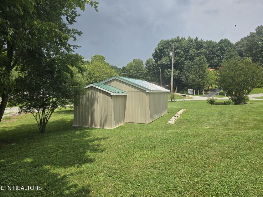 This adorable, fully updated 3 bedroom, 2 full bath home sits on - photo 12