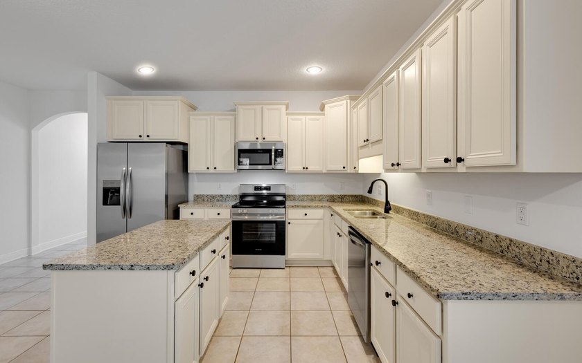 This refreshed (in 2026) 3BR/2BA + office/bonus room home in - photo 3