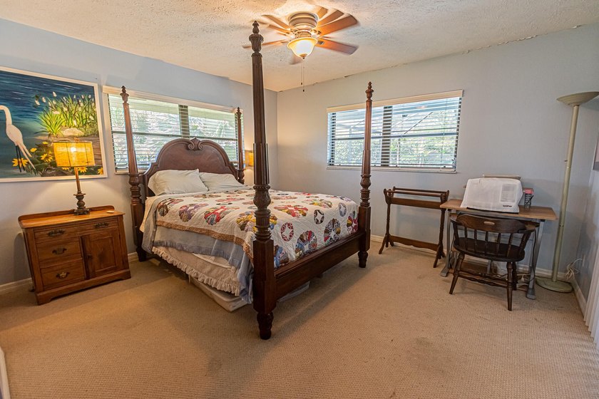 Tropical living awaits in Sandpiper Bay! Situated on an - photo 13
