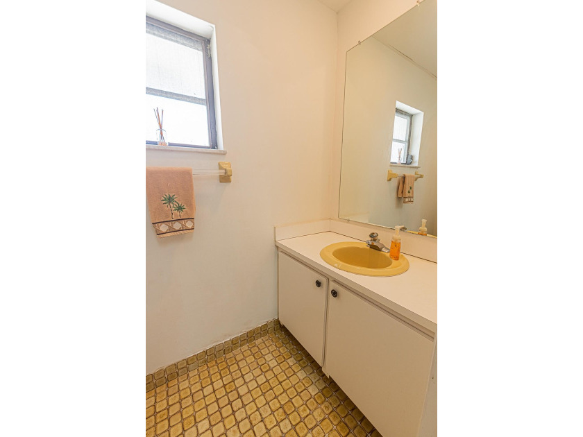 Tropical living awaits in Sandpiper Bay! Situated on an - photo 16