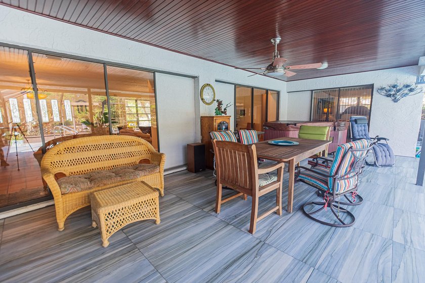 Tropical living awaits in Sandpiper Bay! Situated on an - photo 18