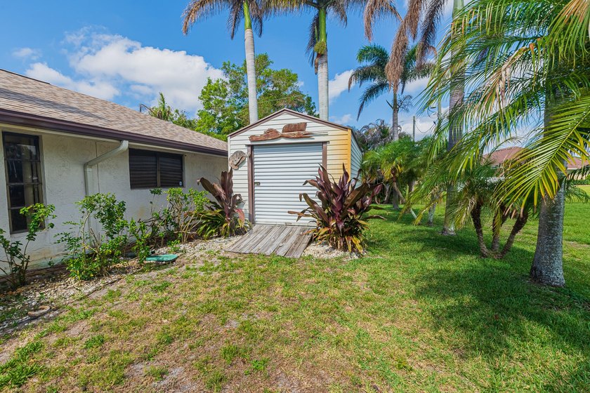Tropical living awaits in Sandpiper Bay! Situated on an - photo 23